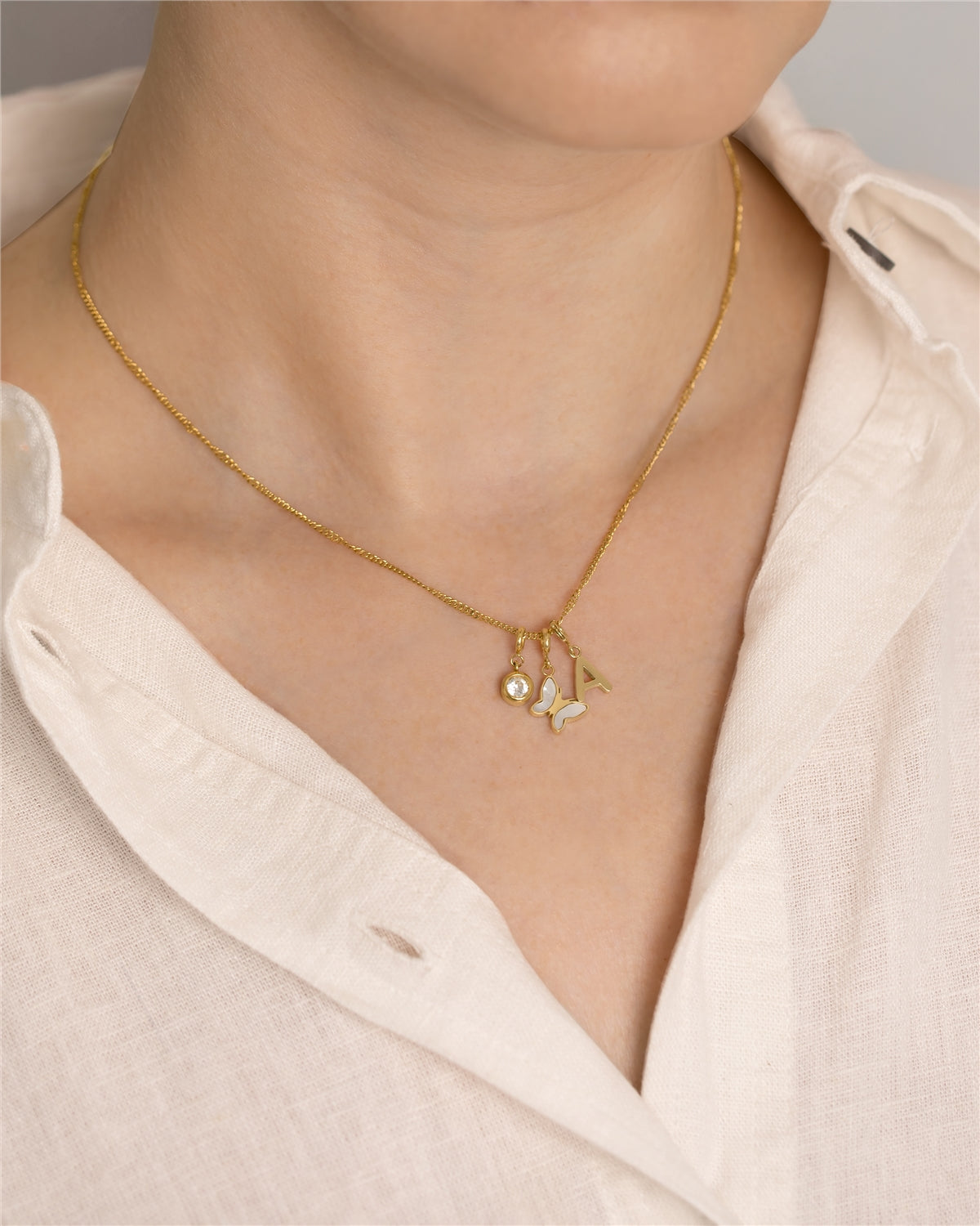 Over & Over Gold 14k Plated White CZ Charm