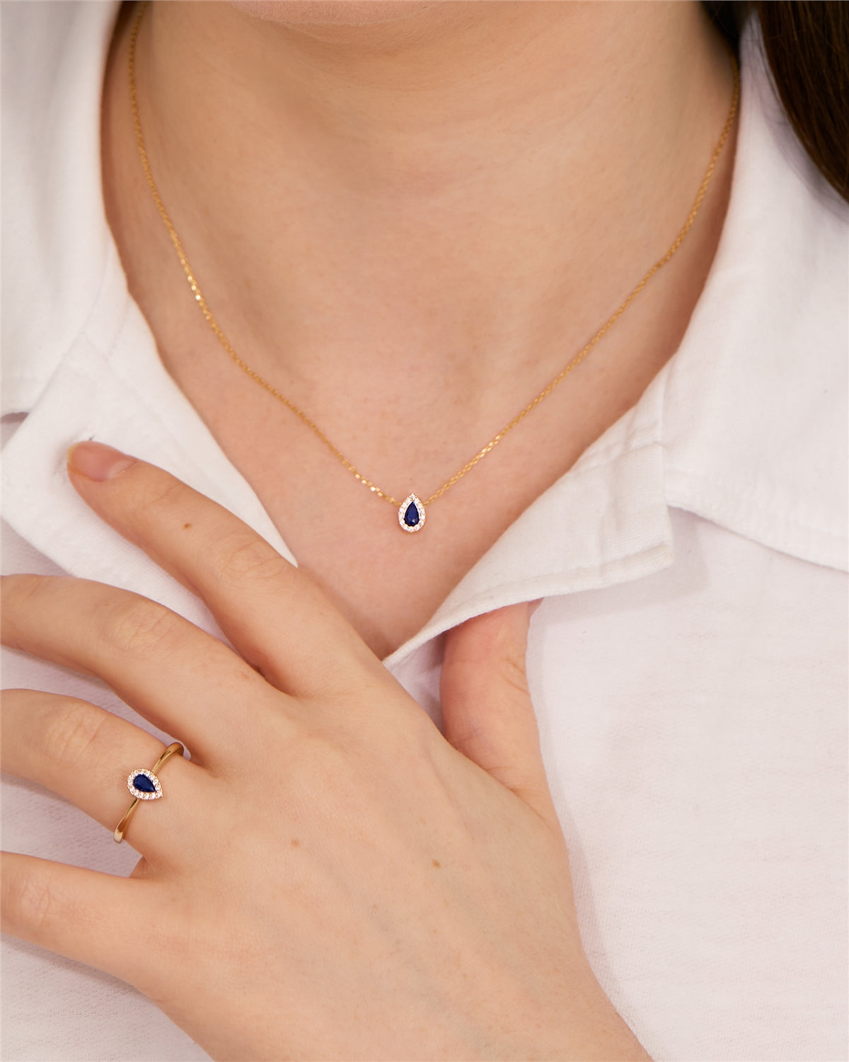 August Woods Gold Blue Halo Teardrop Ring