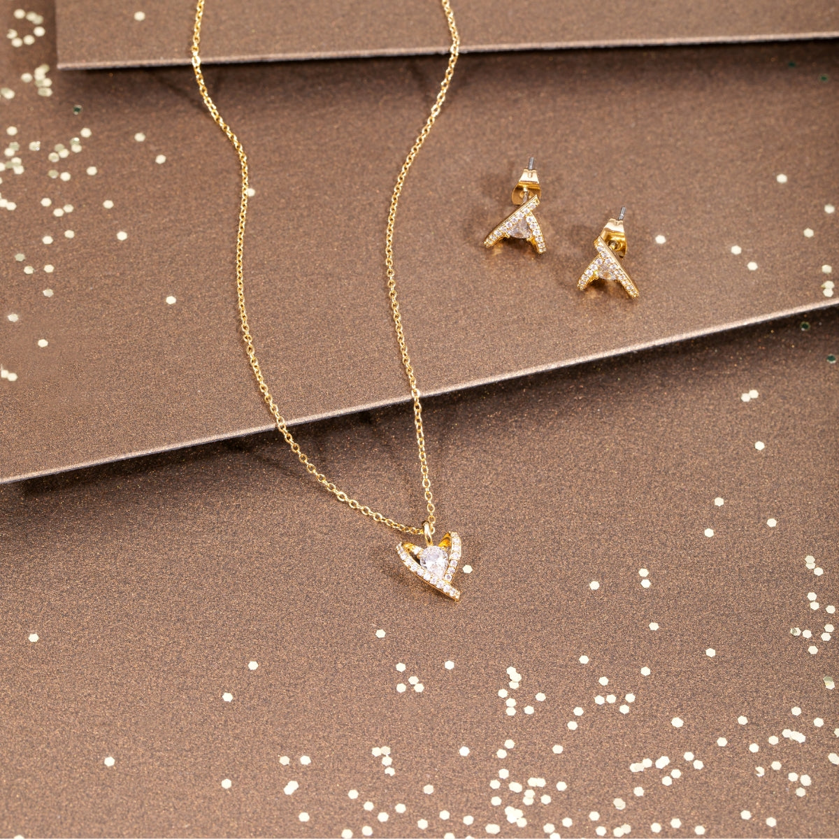 August Woods Gold Solitaire Caged Heart Earrings