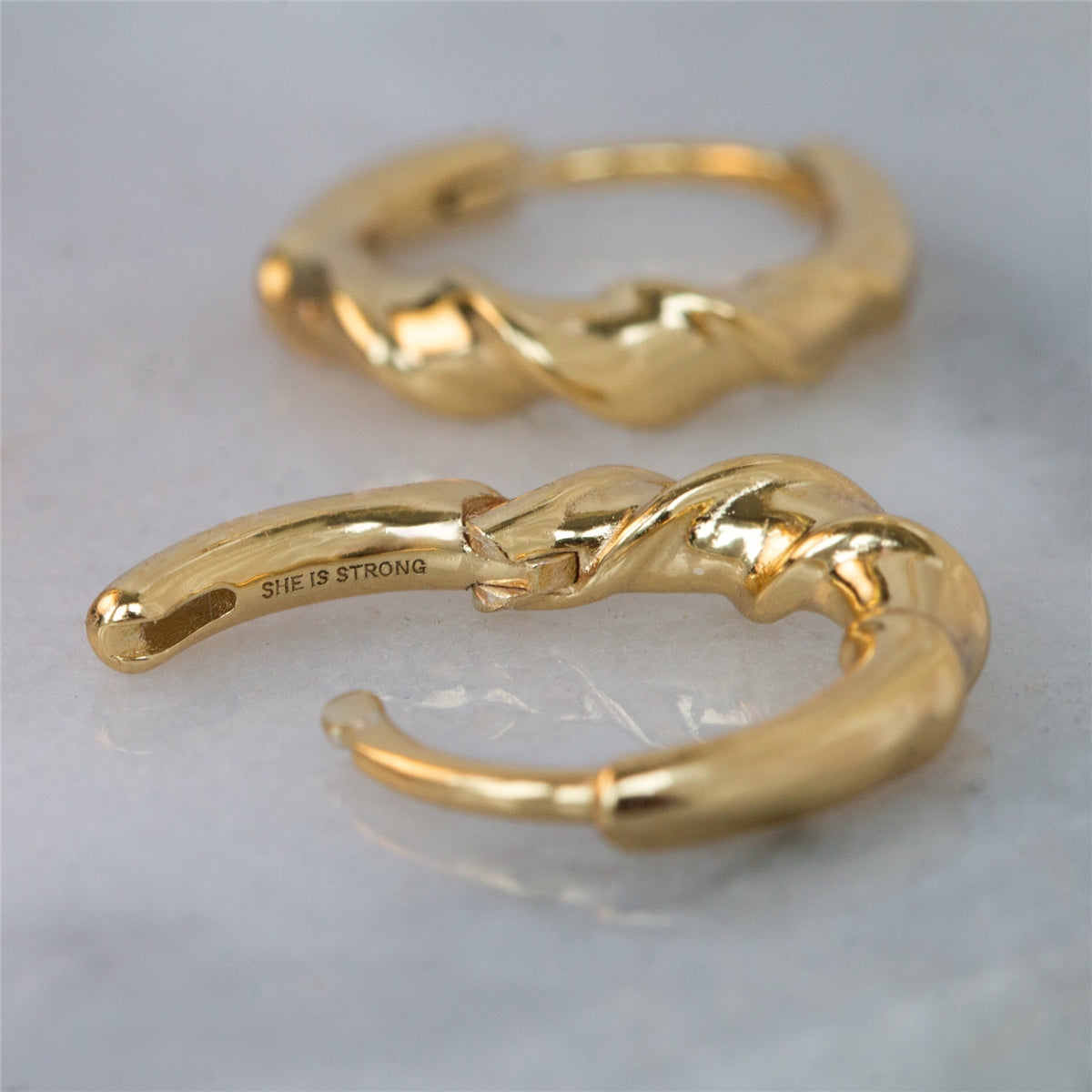 Seek + Find Gold She Is Strong Huggies