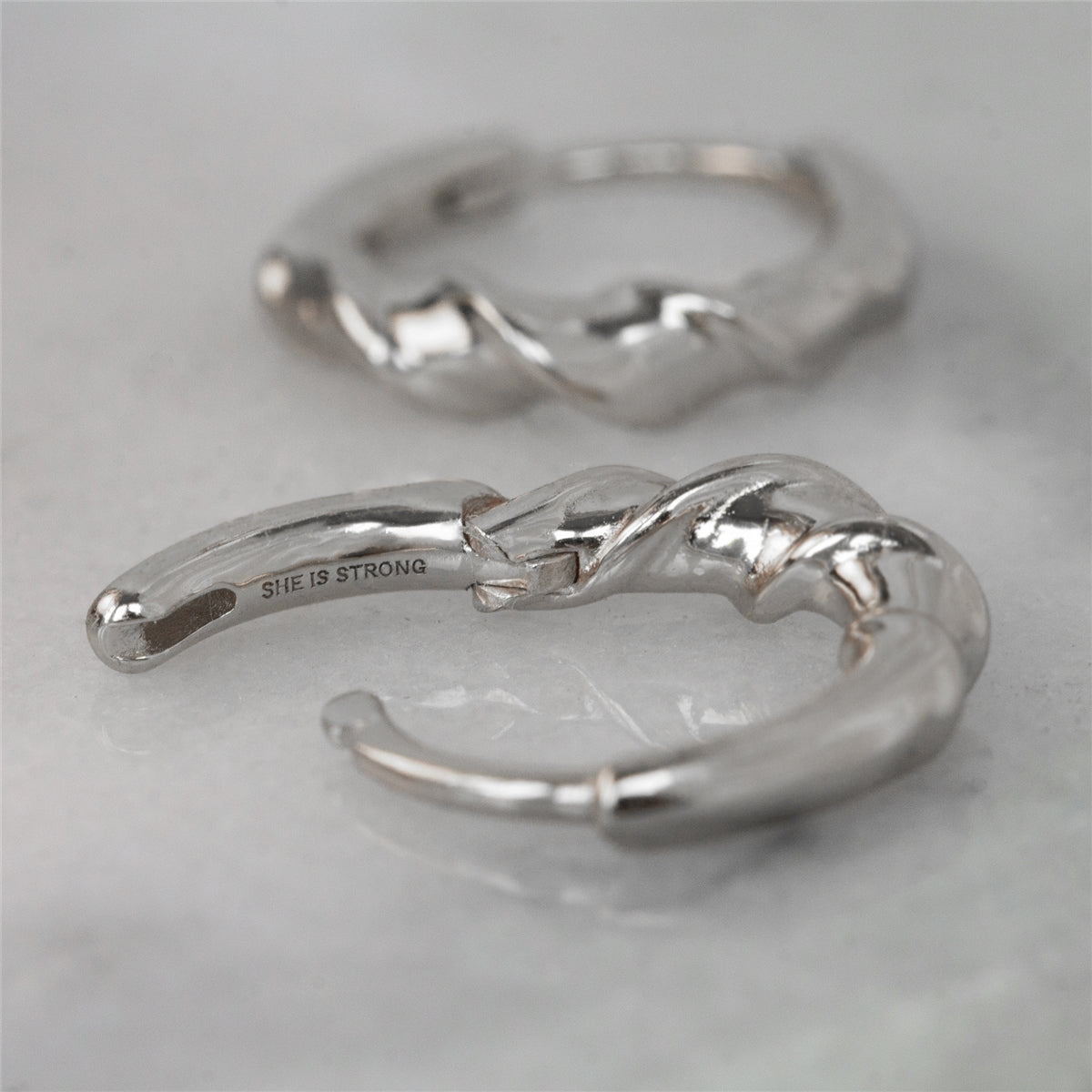 Seek + Find Silver She Is Strong Huggies