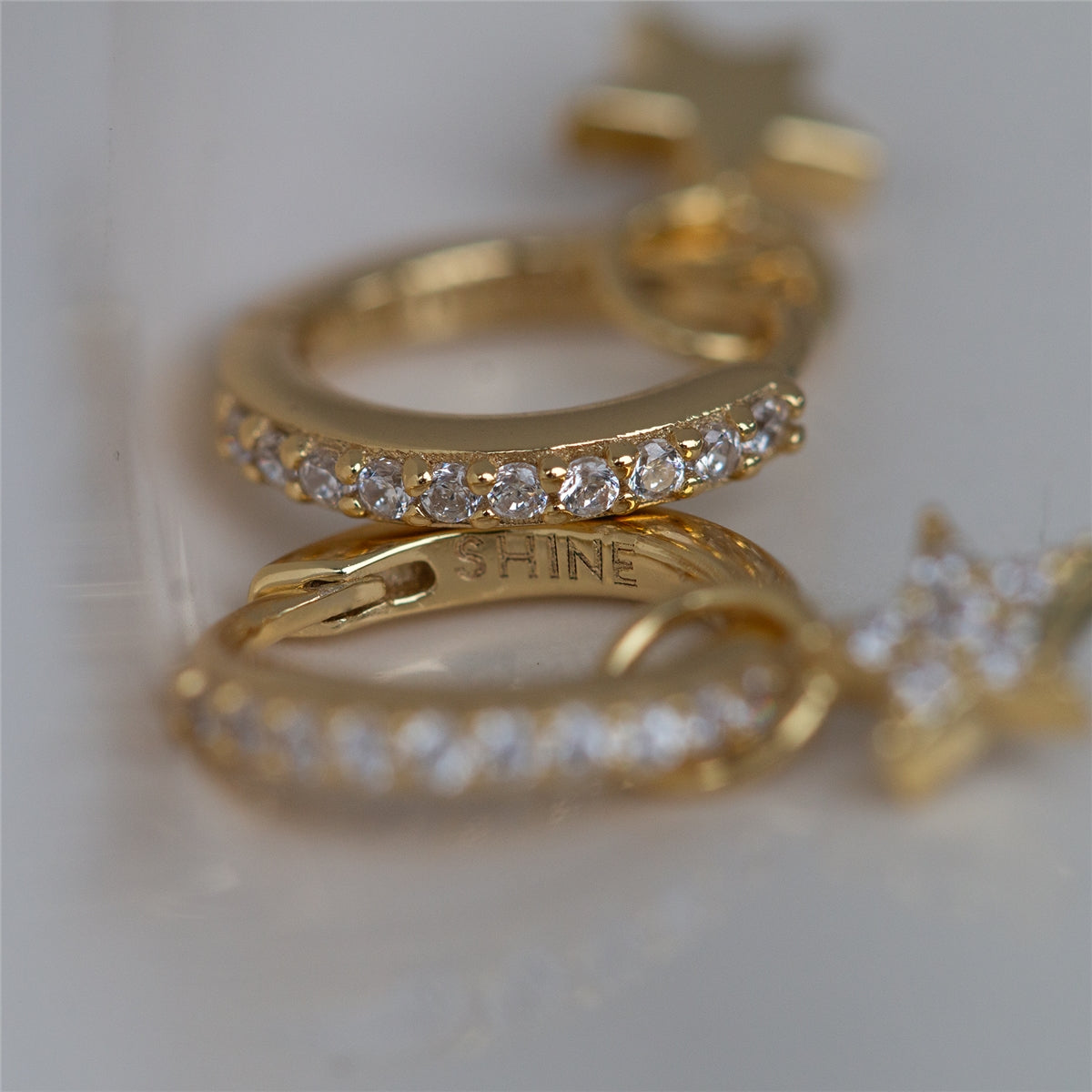 Seek + Find Gold Shine Star Pave Huggies