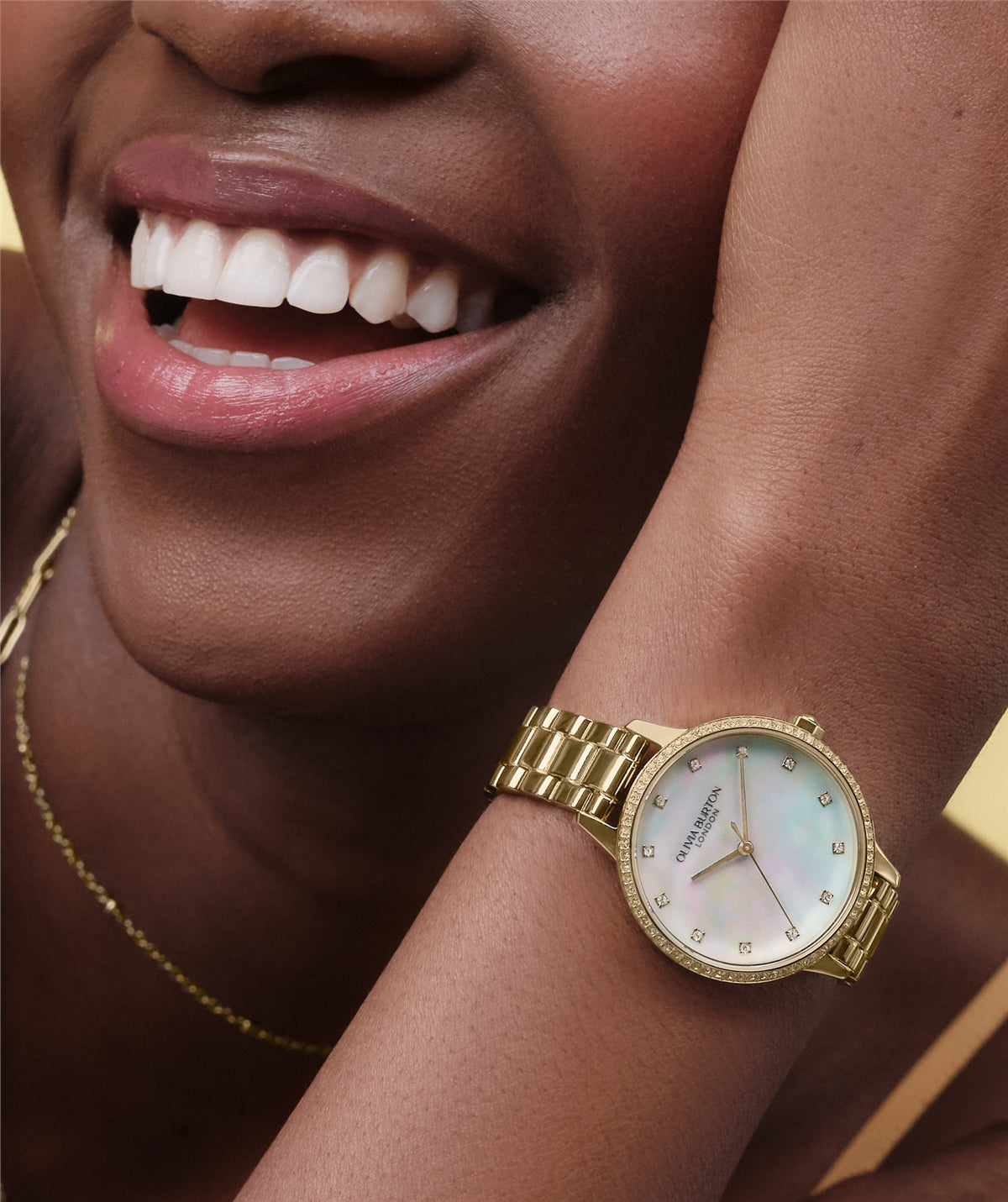 Olivia Burton Gold Captivate Mother of Pearl Dial Watch